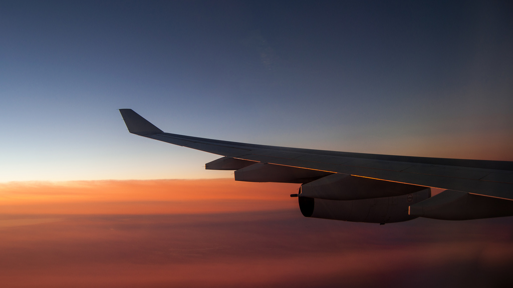 Airplane Over Ocean